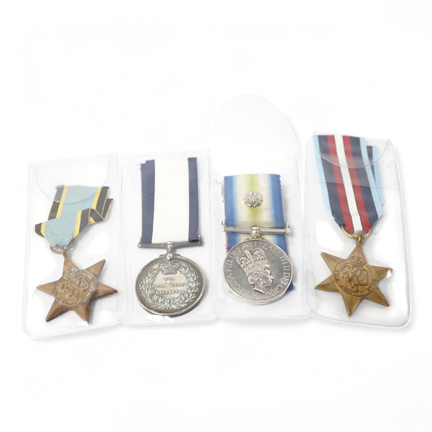 Four reproduction military medals;, an unnamed GVI Naval Conspicuous Gallantry Medal, The Air Crew Europe Star, The Artic Star, South Atlantic Medal, attributed to 24431193 PTE. S.P. Bullivant. PARA., Condition - fair to